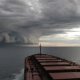Ship sailing into storm clouds